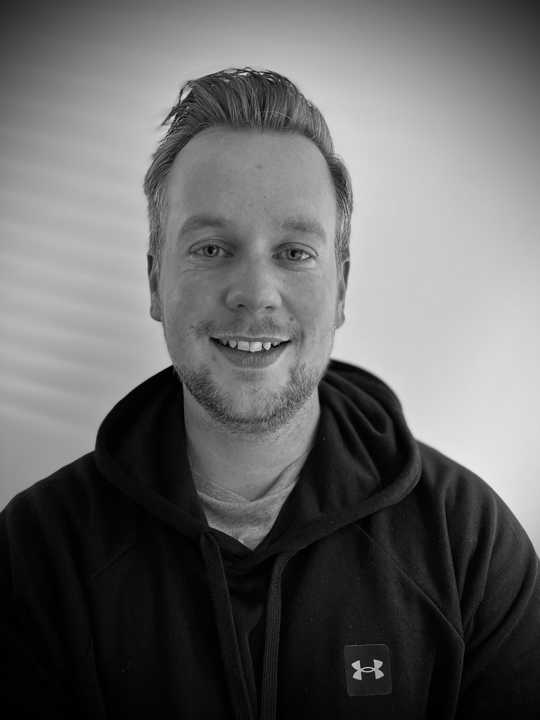 Tomas Häggberg, personlig tränare, ler mot kameran